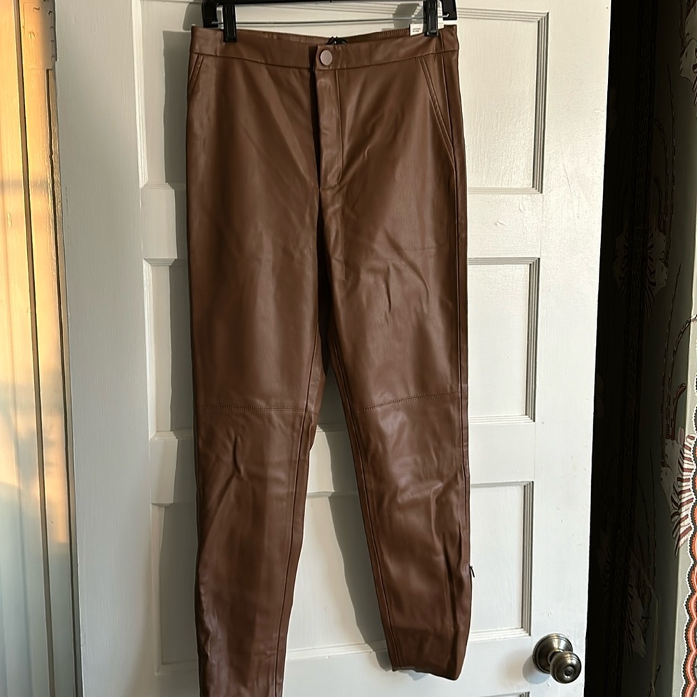 Zara Hi Rise legging in “leather” look chestnut. Zip feature at bottom of legs.